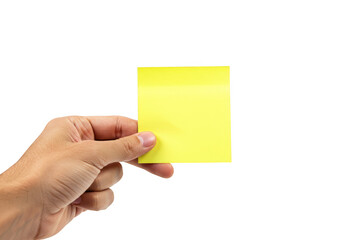 A hand holds a blank yellow sticky note, isolated on a transparent background
