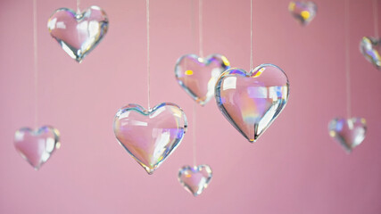 Translucent Heart-Shaped Glass Objects Floating in Soft Ambient Light with Pastel Background