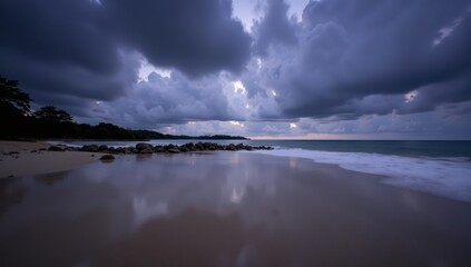 Serene Twilight Beachscape: Dramatic Clouds, Tranquil Ocean, Perfect for Travel, Nature, and Wellness Designs