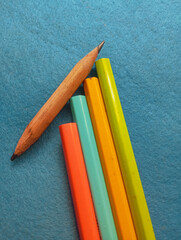 Colorful pencil photo illustration. Back-to-school art kit. Creativity and learning tools. Office and school supplies.
