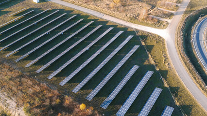 Rows of solar panels are capturing sunlight, generating clean energy in promoting sustainable...