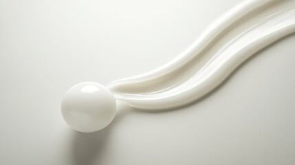 4.A partially squeezed white cosmetic tube with a glossy cream trail flowing from the nozzle, resting on its cap. The neutral gray background creates a serene, professional atmosphere with soft