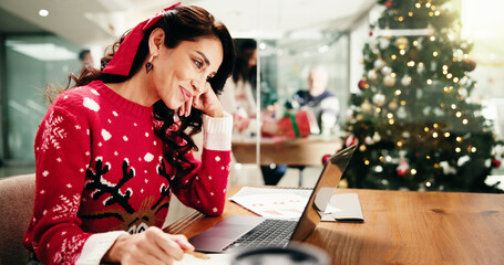 Christmas, business and happy woman on laptop in office for finance report, proposal and company...