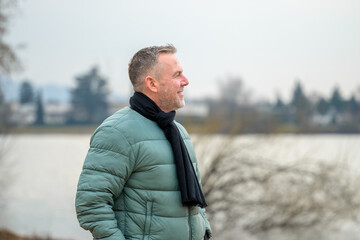 Smiling Man In Winter Landscape
