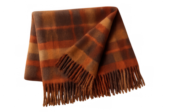 Folded orange plaid wool blanket with fringes isolated on transparent background, perfect for cozy winter days