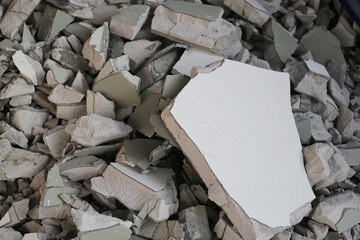 Broken concrete, Piles of lightweight construction bricks after house demolition