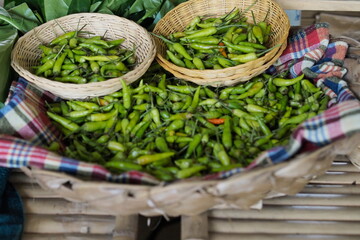 Fresh Green Chilies: Harvested Abundance in Woven Baskets