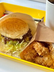 Juicy and flavorful burger paired with crispy, golden fried chicken. A perfect combination of...