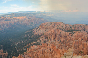 Family hiking in red mountains in Utah on summer vacation. Friends hiking Fairyland Loop Trail . Bryce Canyon National Park, Utah, USA.