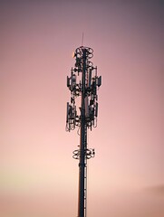 Cell Phone Tower Against Sunset Sky 