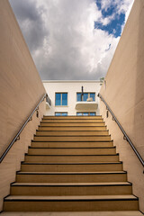Modern Staircase Leading To Residential Building In Munich: Wide Stone Steps With Metal Handrails...