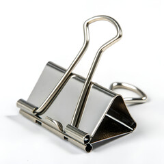 Metal binder clip with black handles isolated on white background