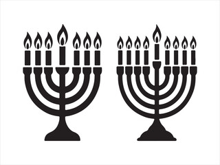 Two black menorahs with lit candles against a white background