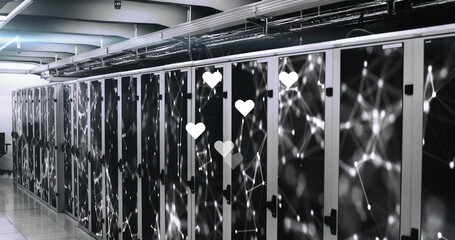 Displaying server racks, LED lights and overhead cable trays holding network cables in datacenter