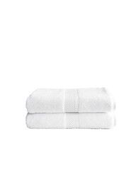 Stacked white towels on a clean background