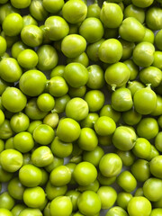 Close-up of fresh green peas, healthy food background, organic vegetable texture, macro photography