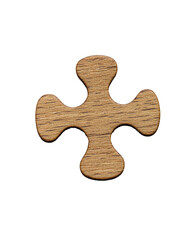 Wooden puzzle piece isolated on black background