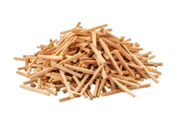 Pile of small light brown wooden sticks on black background