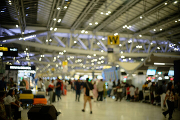 Airport ticket machines and check-in counters (blurred background, defocused)