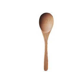 Wooden spoon on a dark background with soft lighting