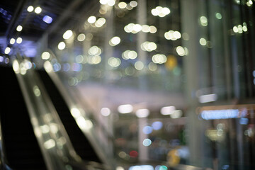Bokeh of unfocused lights near the escalator in the airport