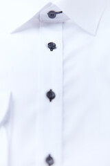 Close up of white Men's shirt.	
