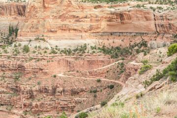 Twisting dirt road into The Grand View of Canyonlands National Park, Utah, USA
