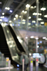 Bokeh of unfocused lights near the escalator in the airport