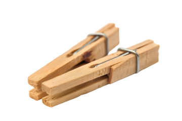 Two wooden clothespins on black background