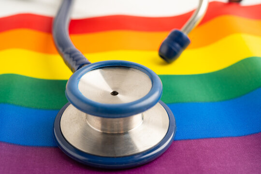 Stethoscope on LGBT rainbow flag, rights and gender equality.