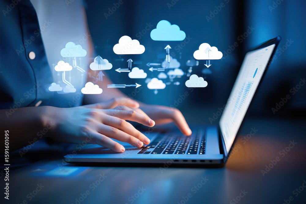 Aufkleber person typing on a laptop with cloud graphics overlayed representing cloud computing technology