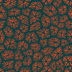 Orange bursts on black form a bold radial pattern with intricate symmetry and graphic style