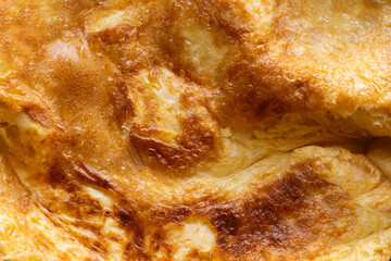 Close-up of fried omelette for textured