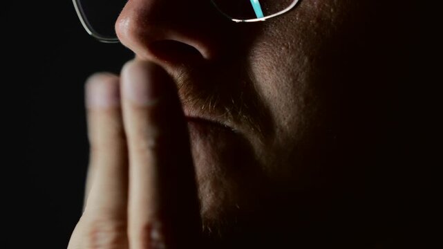 Profile of an adult man wearing fucking glasses, dreaming and thinking about something.
Analysis and planning.
Pensive man in a dark office.
Plan, idea, work, profile, male