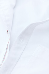 Close up of white Men's shirt.