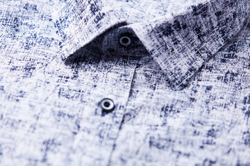 Close up of men's linen shirt. Soft focus.	