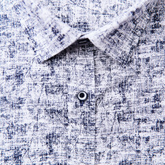 Close up of men's linen shirt. Soft focus.	