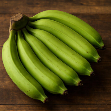 Fresh Raw Green Bananas (Matoke) on Rustic Wooden Surface
