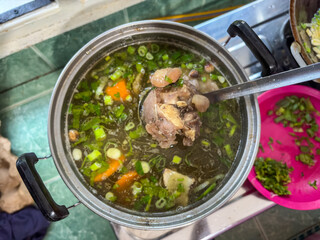 Top view Indonesian Beef Soup Cooking in Pot on Stove