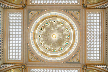 Ornate dome with intricate geometric patterns and a central light. The symmetrical design features...