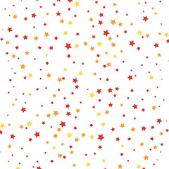 Fototapeta premium Festive star pattern featuring red, yellow and orange stars scattered on a white background creating a celebratory design.