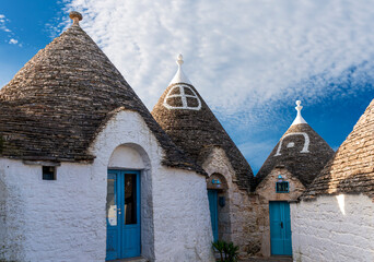 old mediterranean architecture buildings trulli in Alberobello, Italy. Landmark with traditional ancient houses with white walls.