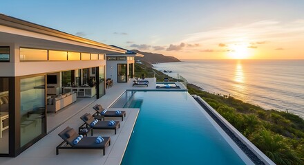 Fototapeta premium Serene ocean view villa with infinity pool at sunset for luxury living and vacation in a tropical