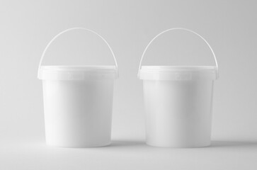 Plastic paint or food bucket tub container mockup on neutral background