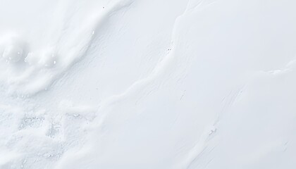 Obraz premium Snowdrift Texture A close up view of a snowdrift with its uneven