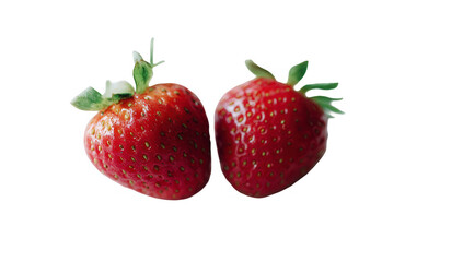 Two fresh, vibrant red strawberries, close-up, against a black backdrop