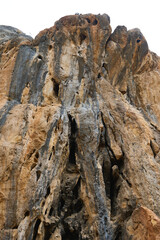 Close-Up View of a Rugged Rock Formation with Erosion Details