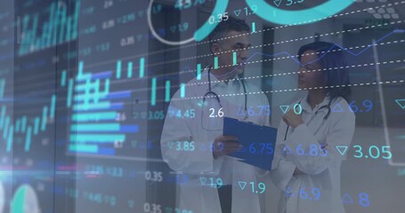 Male doctor entering joining female doctor examining medical charts on clipboard reviewing progress - Powered by Adobe