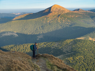 Hiker on Mountain Trail with Stunning Carpathian Views