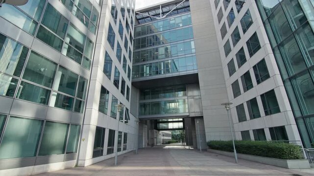 Contemporary city skyline with tall office towers and modern architecture of business buildings representing innovation and corporate success in urban area